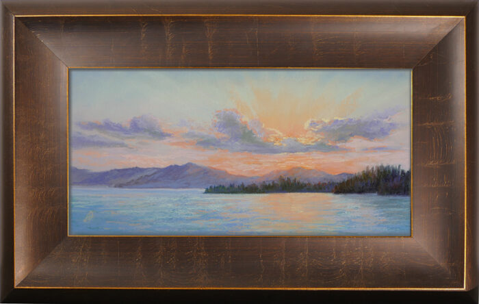Photo of a framed pastel painting of Flathead Lake.