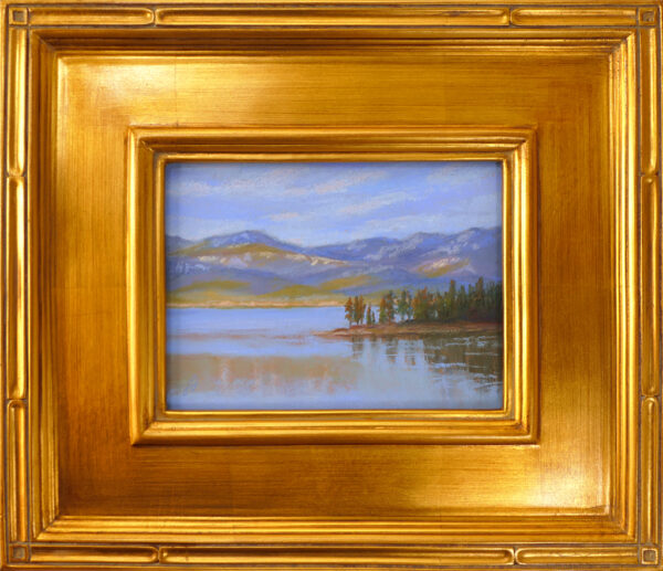 Pastel painting of Flathead Lake and Yenne Point with gold frame.
