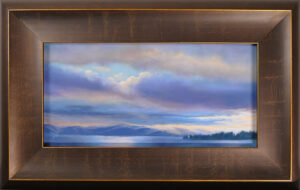 Pastel painting of Flathead Lake with sunlight breaking through in a frame.