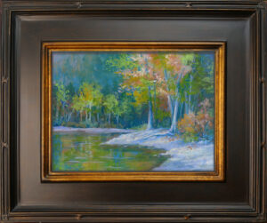 Photo of a painting of lakeside trees in pastel with frame.