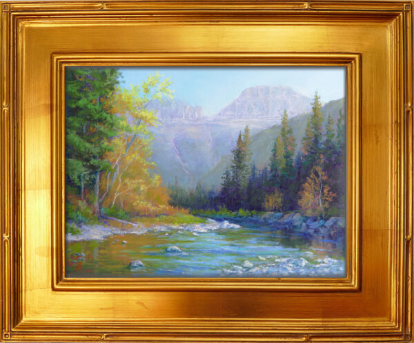 Photo of a pastel painting of McDonald Creek in Glacier National Park with frame.