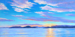 Photo of a painting of a Flathead Lake sunset.