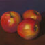 Photo of a pastel painting of a trio of apples.