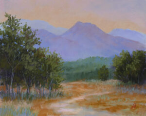Photo of a pastel painting of East Glacier looking west into the orange sunset.