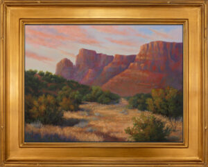 Photo of a pastel painting of the Sedona landscape in the late afternoon light.