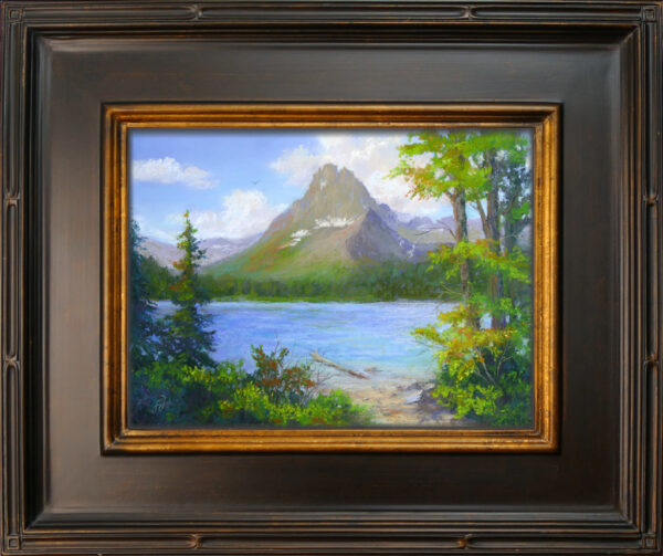 Photo of a pastel painting of Grinnell Point in Many Glacier with frame.