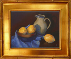 Pastel painting of lemons and a clay vase in gold frame.