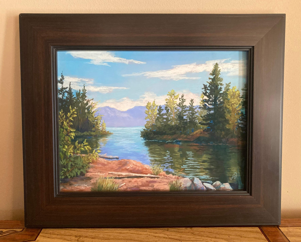 Painting of a landscape scene of Flathead Lake.