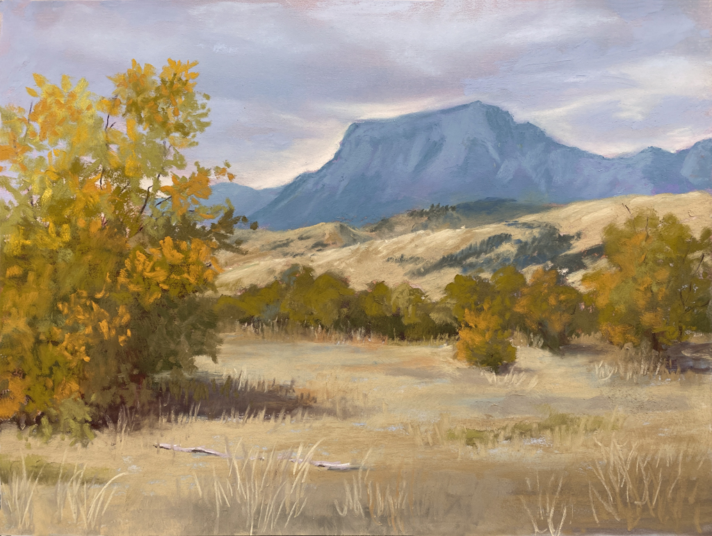 Photo of a pastel painting of Ear Mountain in Choteau, Montana.