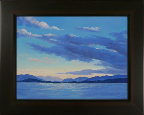 Photo of a pastel painting of an evening sky over Flathead Lake with frame.