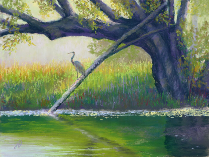 Photo of a pastel painting of a Great Blue Heron perched over a river.