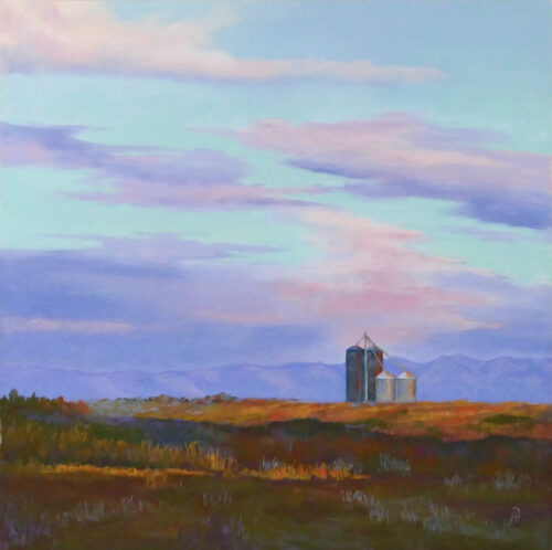 Photo of a pastel painting of silos in a field during sunrise.