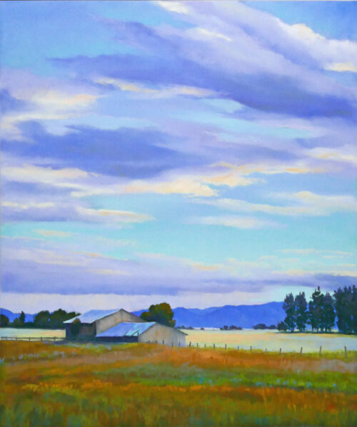Photo of a pastel painting of a barn in the landscape.