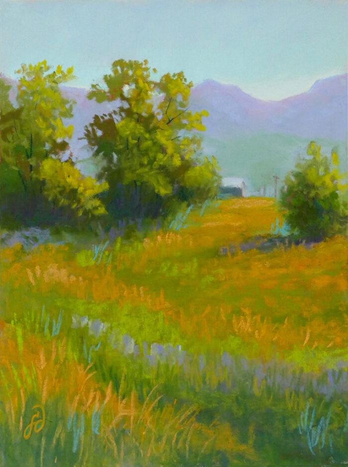 A photo of a pastel painting of a rural scene in Montana.